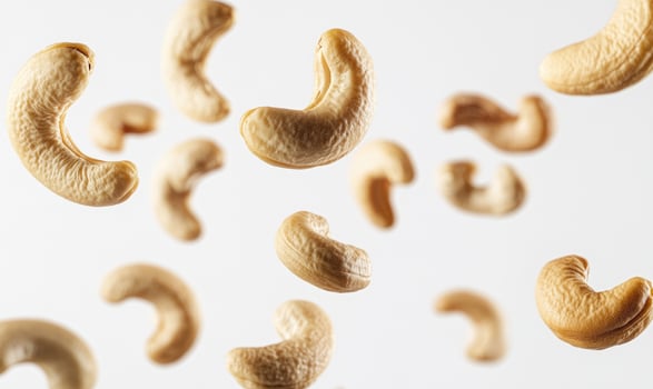 A bunch of cashews dynamic shot photo