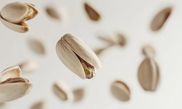 A bunch of pistachios nuts closeup photo