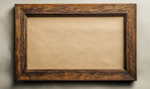 a wooden frame with a blank sheet of paper photo