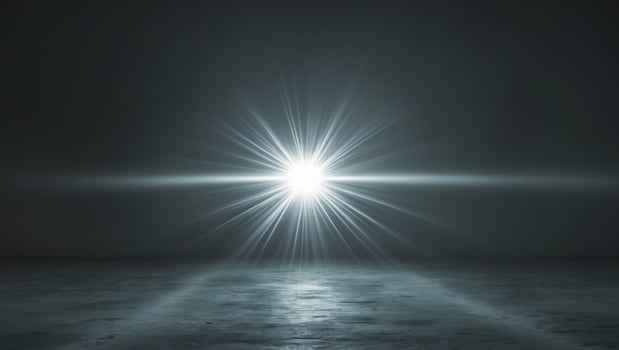 A bright light shining through a dark room photo