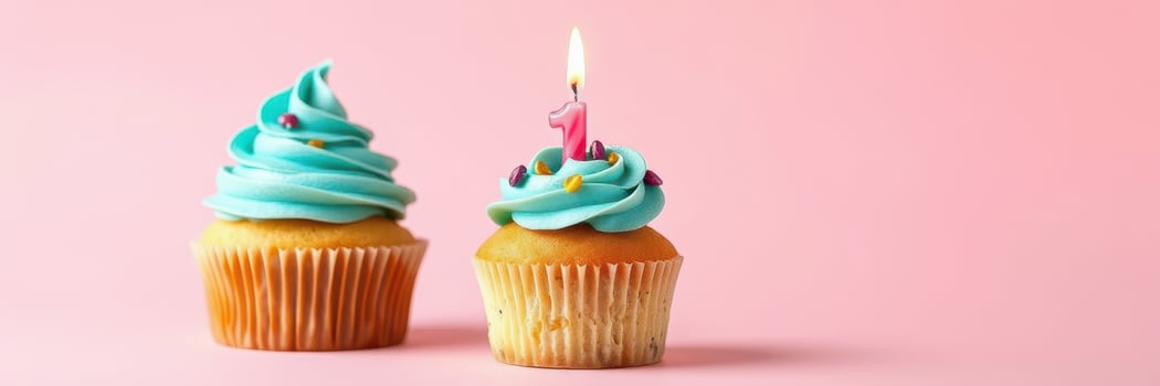 Colorful birthday cupcakes with blue frosting and a single candle celebrate a special occasion photo
