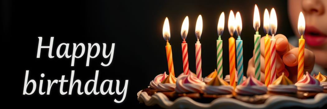 Celebration with colorful birthday candles glowing on a cake during a festive gathering photo