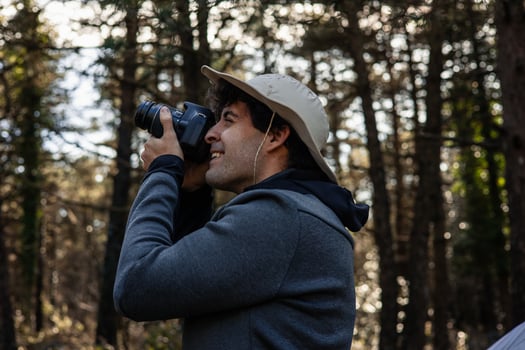 closeup Nature Photographer Capturing Wildlife in the Wilderness photo