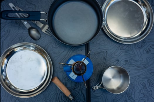closeup Top-Down View of Camping Table with Cooking Essentials photo