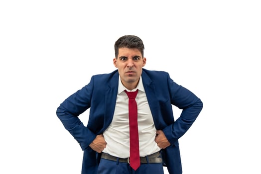 Furious Businessman Staring at Camera with Hands on Hips white background photo
