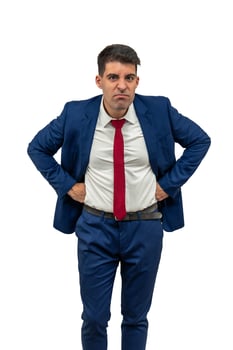 vertical Furious Businessman Staring at Camera with Hands on Hips white background photo