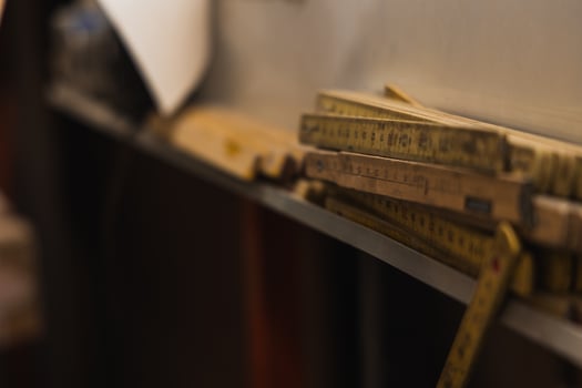Closeup of Vintage Professional Measuring Tape in Carpentry Workshop photo