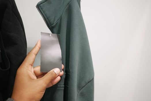 Blank price tag on shirt photo