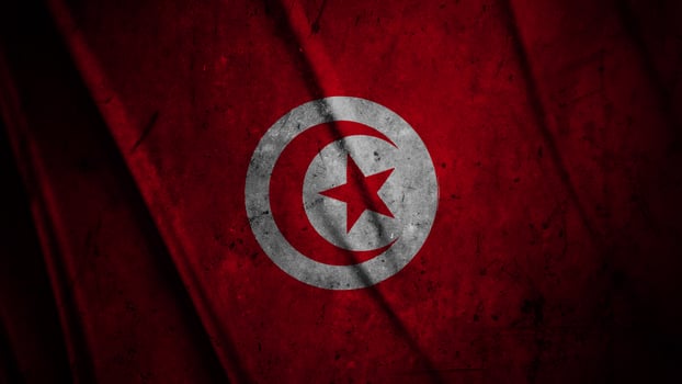 Tunisia grunge silk flag waving in the wind background illustration, grunge textured flag on silk photo