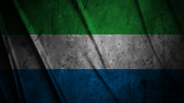 Sierra Leone grunge silk flag waving in the wind background illustration, grunge textured flag on silk photo