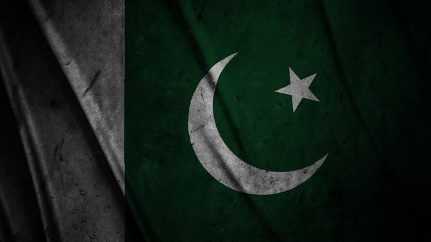 Pakistan grunge silk flag waving in the wind background illustration, grunge textured flag on silk photo