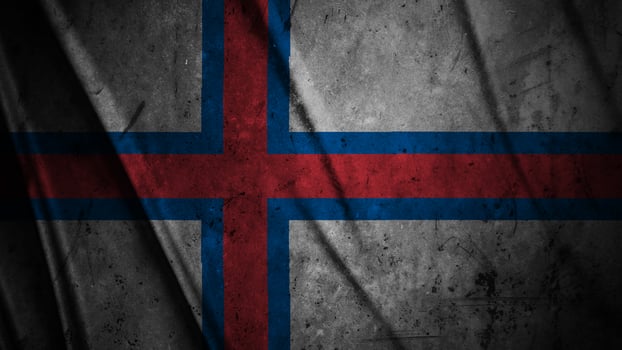 Faroe Islands grunge silk flag waving in the wind background illustration, grunge textured flag on silk photo