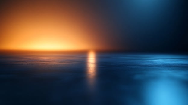 A blurry image of a body of water with a reflection of the sky photo