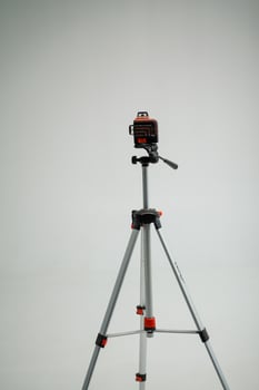 Laser level on a tripod for measurement photo