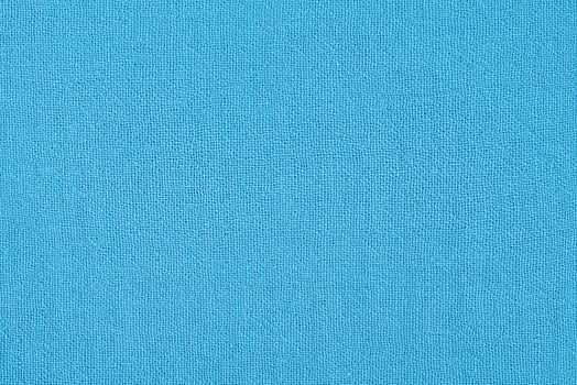 Blue muslin fabric as a background macro photo. photo