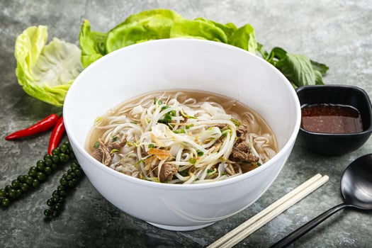 Vietnamese traditional soup Pho Bo with beef photo