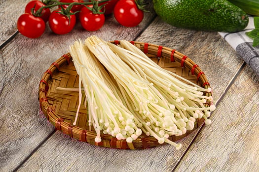 Raw enoki mushroom for cooking photo