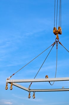 shipping crane on blue sky background photo