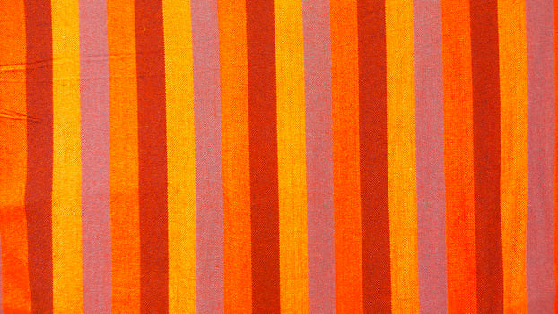 A striped orange and pink fabric photo