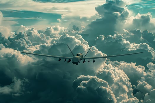 A large airplane flying through the clouds photo