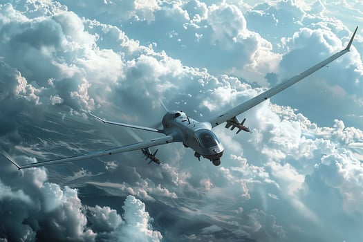 A large military plane flying through the sky photo