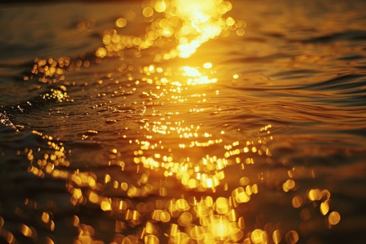 Sunset over water with bubbles and sunlight photo