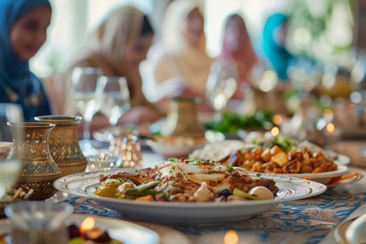 A table with many plates of food photo