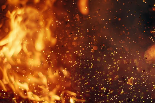 A close up of a fire with sparks and flames photo