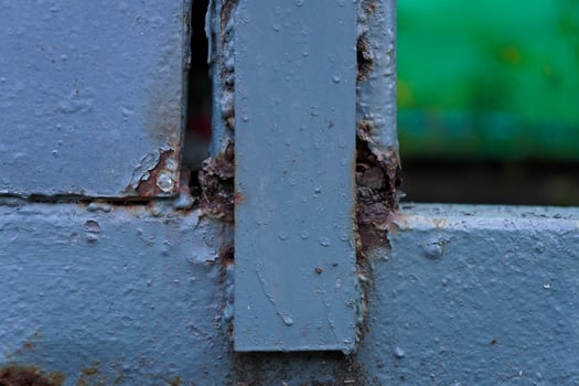 Close-up of a rusty iron door. photo