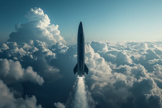 A rocket is flying through the clouds photo