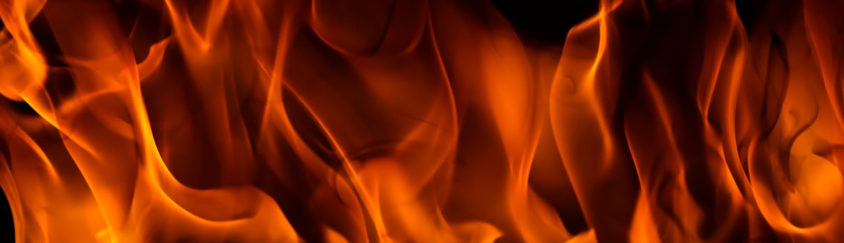 Red blaze Fire flame on a black background photo