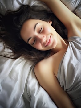 Peaceful woman sleeping on bed photo