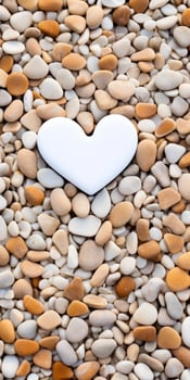 heart shaped stone surrounded by pebbles photo