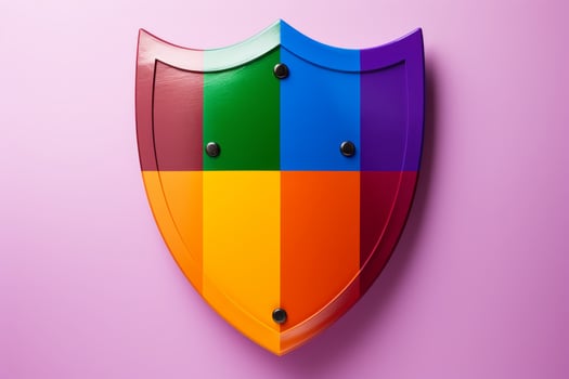 Colorful shield design on pink background photo