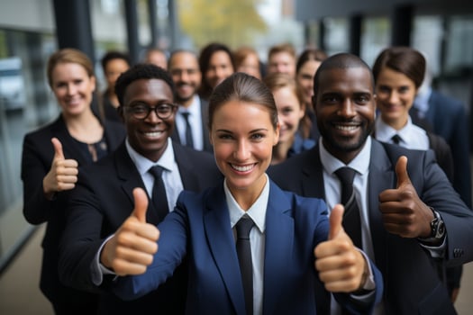 Diverse business team giving thumbs up photo