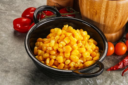 Sweet canned ripe corn grain photo
