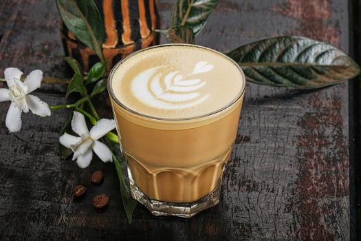 Hot cappuccino coffee in the glass photo