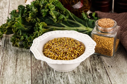 Mustard sauce with seeds in the bowl photo