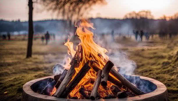 Campfire with Blurry People in Background photo