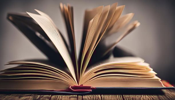 Open Book on Wooden Surface photo
