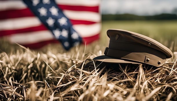 Military Hat and American Flag photo
