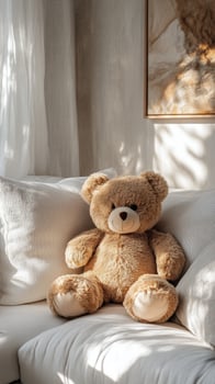 A teddy bear sitting on a couch photo