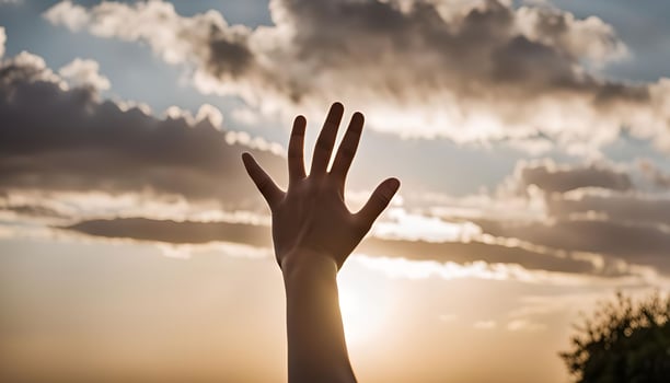 Hand Reaching Towards the Sun photo