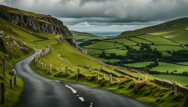 Scenic Winding Road Through Rolling Green Hills photo