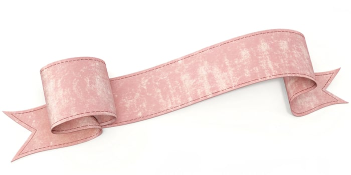 Pink ribbon banner with gold ornament isolated white background for your design event. photo