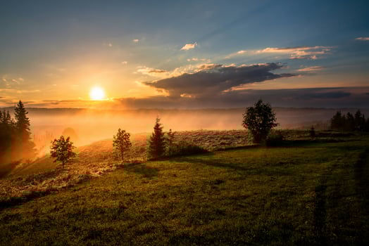 Sunset Over Lush Valley Fields photo