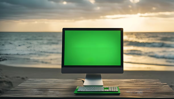 Computer on a Beach with Sunset photo