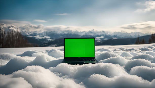 Laptop on Snowy Mountain photo