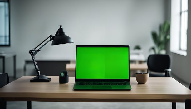 Laptop on a Desk in a Modern Office photo