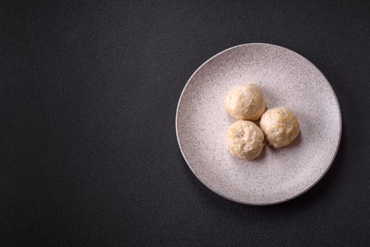 Delicious healthy steamed chicken cutlets or minced meatballs photo